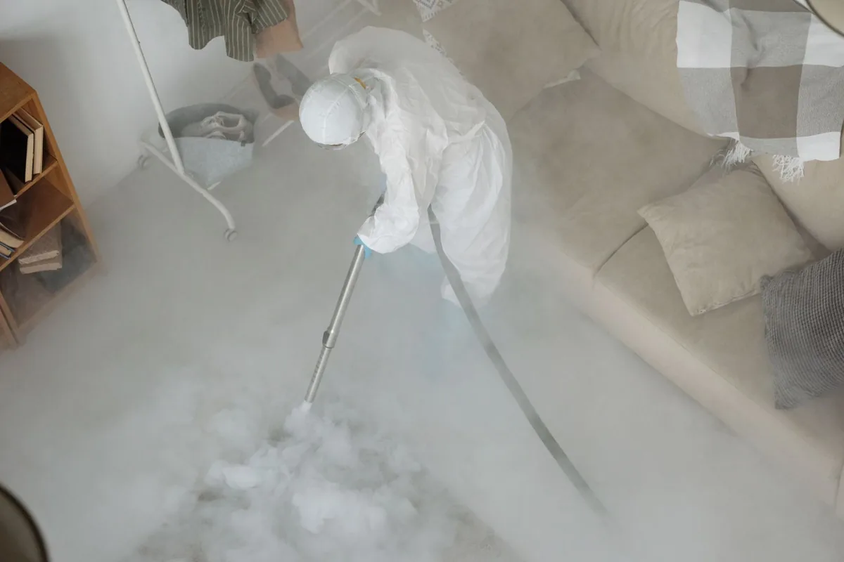 Biohazard cleanup technician in protective equipment, Merced Manor, San Francisco, CA